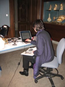 Joaneath working on the installation of the Collector’s Study, ca. 2005