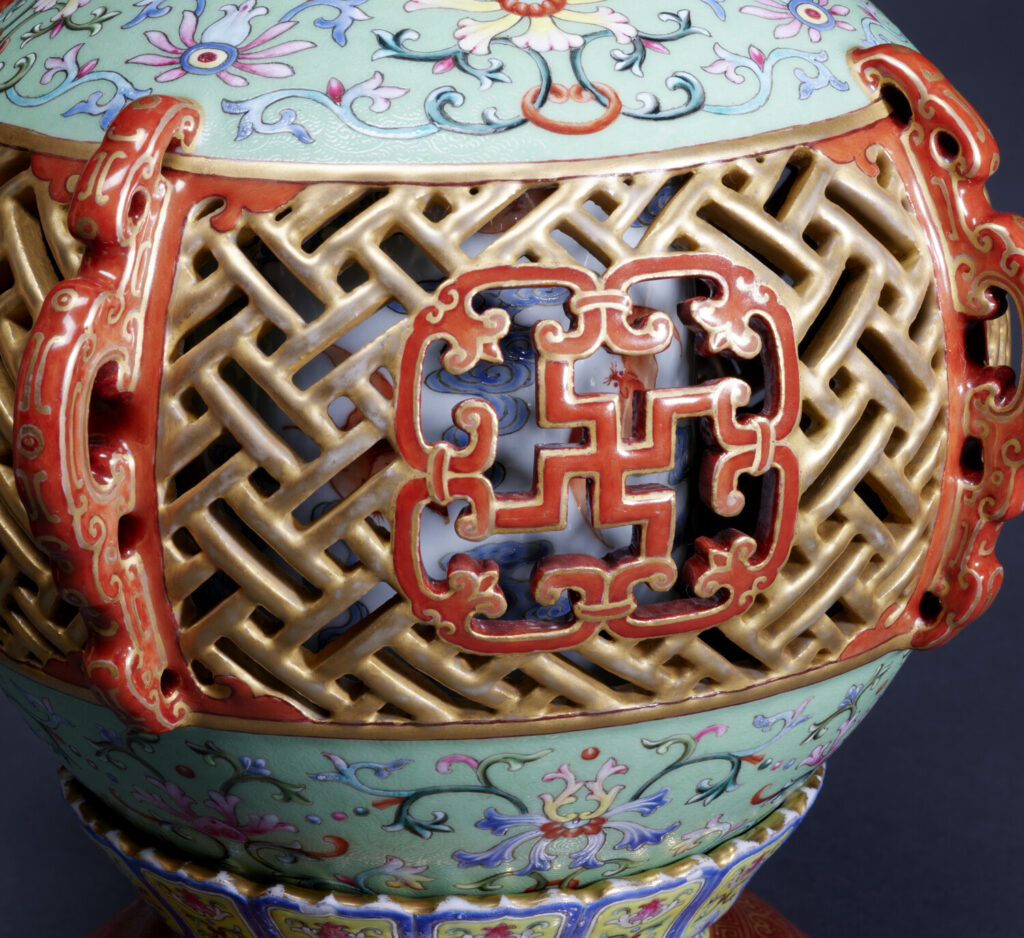 Detail of the revolving interior vase with bats-and-clouds design and the swastika motif on the exterior gourd wall, One of a Pair of Revolving Gourd-Shaped Vases, acc. no. 49.2180